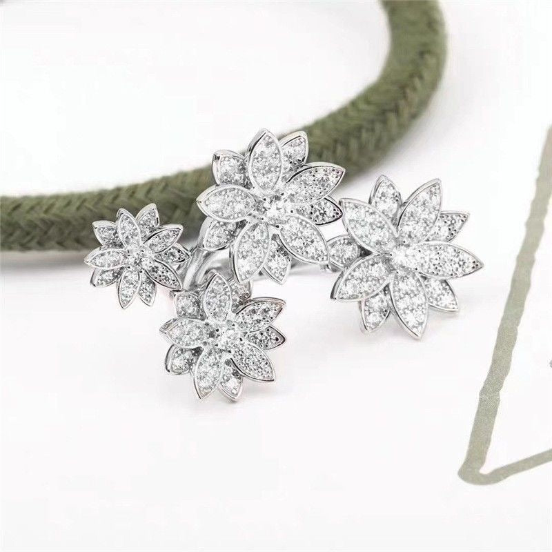 van cleef floral diamond ring cluster ring silver white gold inexpensive luxury diamond buy sell